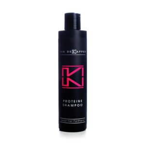 Flesje met 250 ml Van deKapper proteine shampoo verrijkt met panthenol.